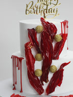 Crimson Elegance Two-Tier Abstract Sail Cake