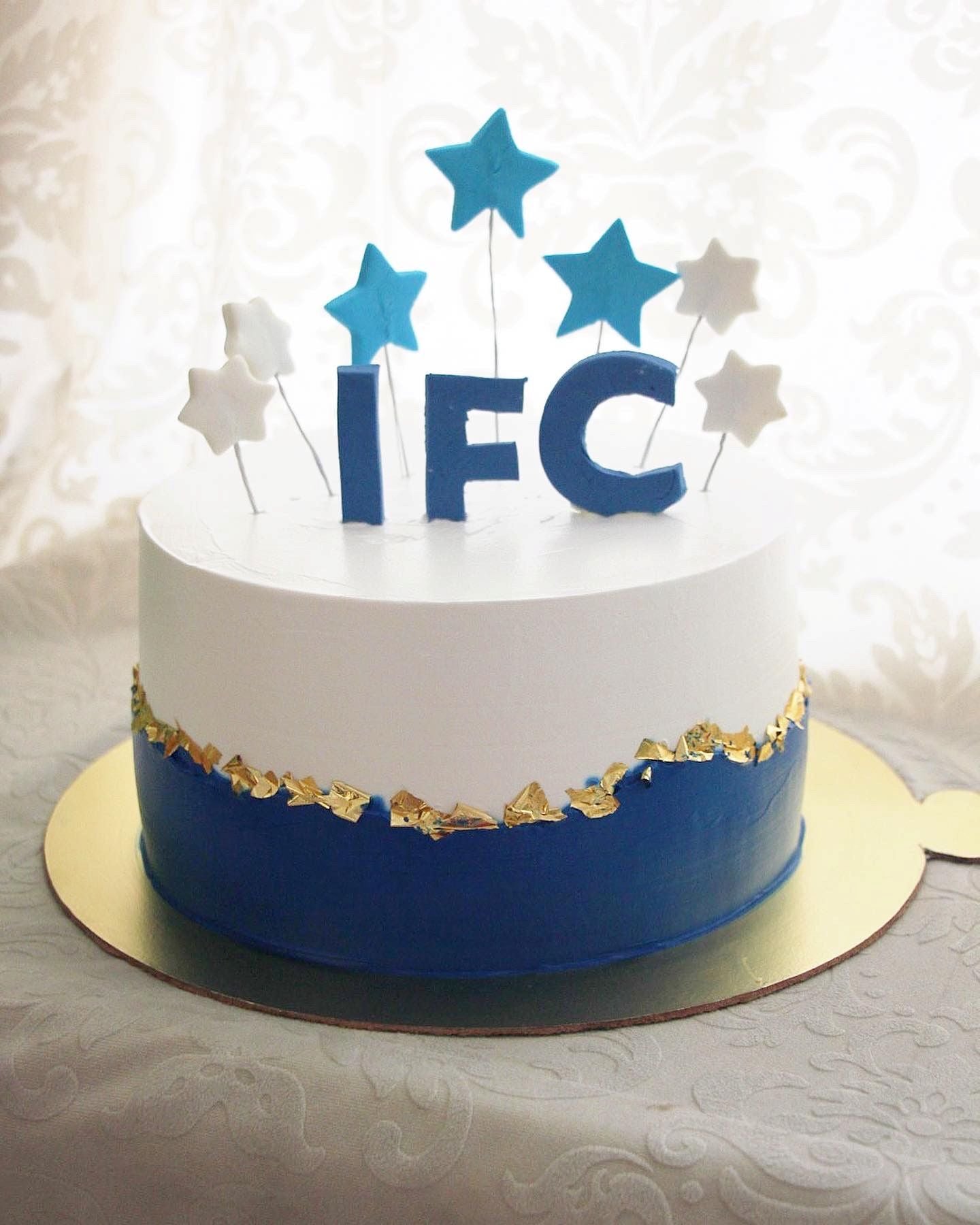 Blue & White IFC Celebration Cake with Gold Leaf | Custom Birthday Cake