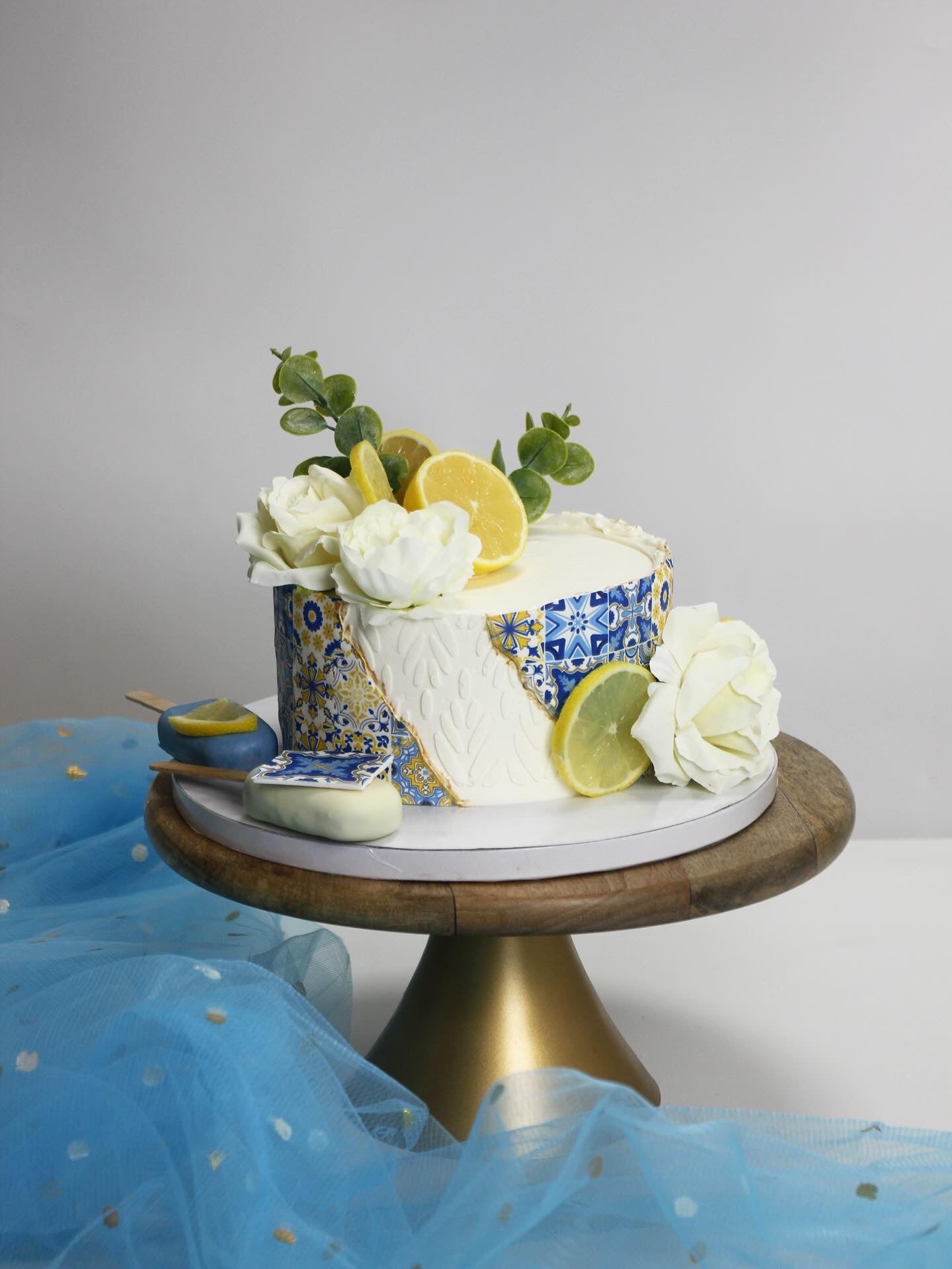 Mediterranean Lemon Floral Cake with Blue Tile Design | Elegant Custom Cake