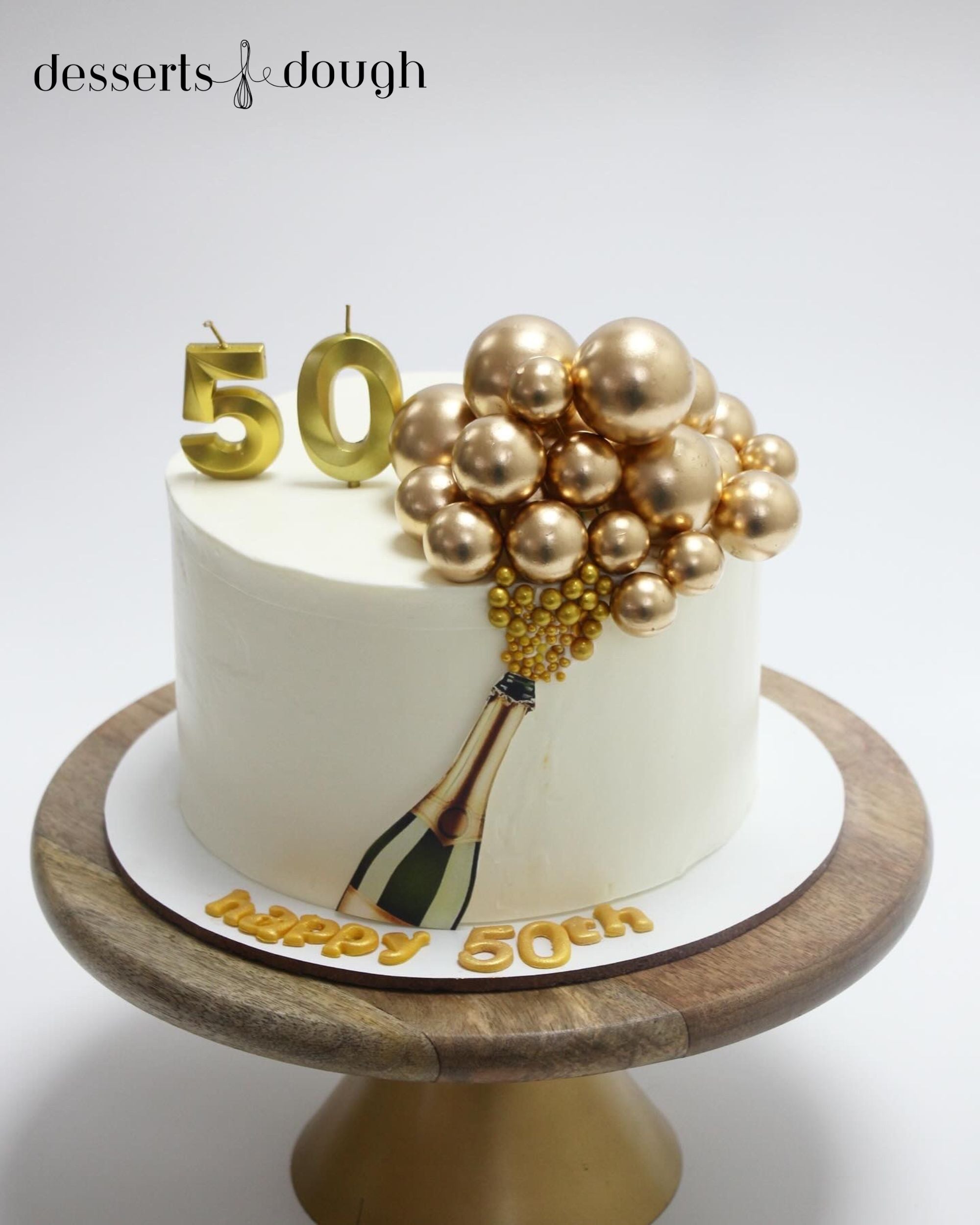 Elegant 50th Birthday Champagne Cake – Gold Balloon Celebration Cake