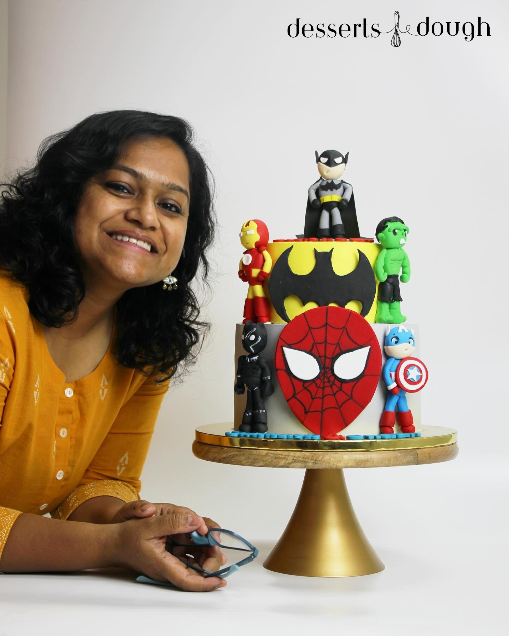 Earth’s Mightiest Two-Tier Superhero Assembly Cake