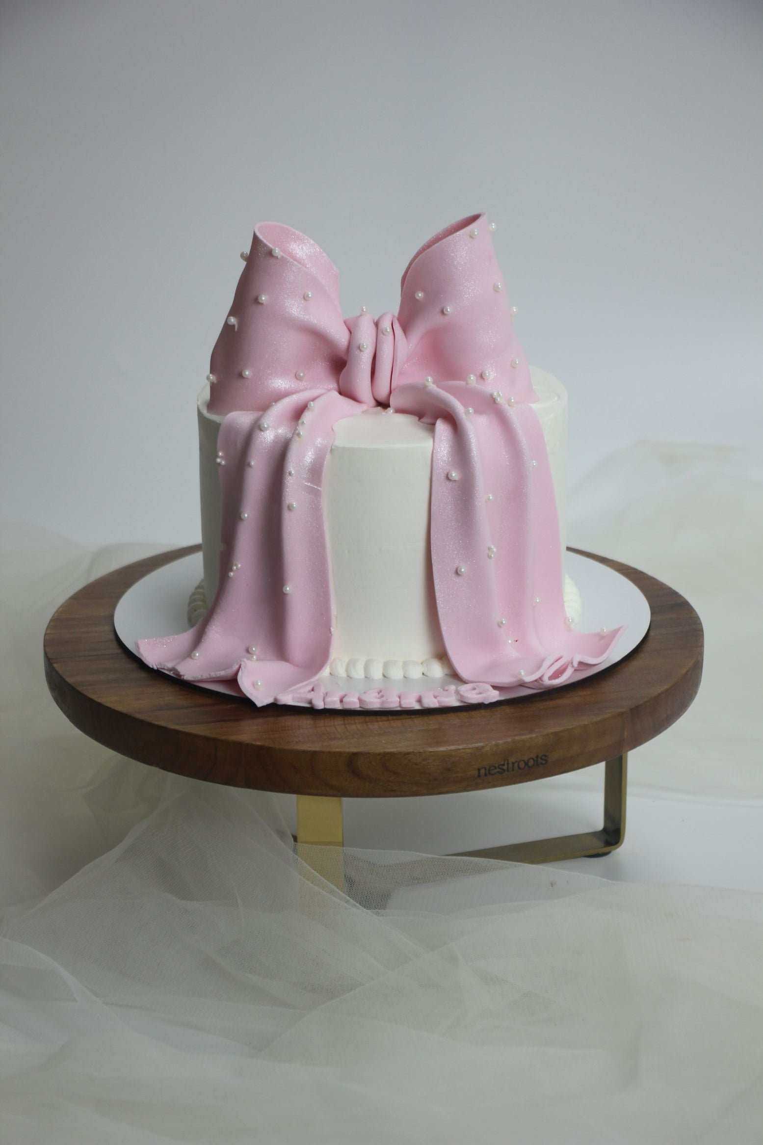 Elegant Pink Bow Birthday Cake