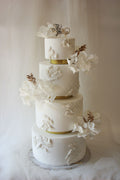 Luxury White Wedding Cake – Elegant Four-Tier Floral Wedding Cake with Gold Accents